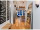 Hallway view showcases open floor plan, kitchen, and natural light from windows at 2955 Inca St # 2F, Denver, CO 80202
