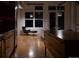 Cozy living room featuring hardwood floors, Eames chair, and an open concept design at 2955 Inca St # 2F, Denver, CO 80202