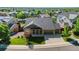 Attractive single-story home featuring a well-kept lawn and a two-car garage, nestled in a serene neighborhood at 3853 S Malta St, Aurora, CO 80013