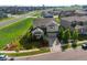 Stunning aerial view of a two-story home featuring lush landscaping and a fenced backyard in a Gathering-friendly neighborhood at 3853 S Malta St, Aurora, CO 80013