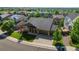 Desirable single-story home featuring a well-kept lawn and a two-car garage, nestled in a serene neighborhood at 3853 S Malta St, Aurora, CO 80013