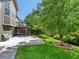 Backyard featuring a patio, lawn, and mature landscaping at 3853 S Malta St, Aurora, CO 80013
