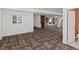 Unfinished basement with updated carpeting at 3853 S Malta St, Aurora, CO 80013