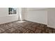 Bedroom with ample natural light and patterned carpeting at 3853 S Malta St, Aurora, CO 80013