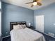 Inviting bedroom with a ceiling fan and a plush bed provides a relaxing retreat at 3853 S Malta St, Aurora, CO 80013