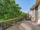 Outdoor deck overlooking lush greenery and blue skies at 3853 S Malta St, Aurora, CO 80013