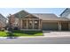 Charming single-Gathering home boasting a manicured lawn and a two-car garage, complete with a covered porch at 3853 S Malta St, Aurora, CO 80013