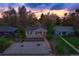 Aerial view of a charming single Gathering home with a well manicured yard and lovely landscaping at 1645 Wabash St, Denver, CO 80220