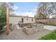 Backyard with comfortable seating area, custom planter, patio, and lovely garden at 1645 Wabash St, Denver, CO 80220