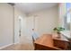Bedroom with a dedicated desk area, natural light, and view to other rooms at 1645 Wabash St, Denver, CO 80220