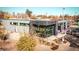 A modern commercial building with a sleek design, featuring floor-to-ceiling windows and a contemporary entrance at 1645 Wabash St, Denver, CO 80220