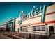 Exterior view of the Stanley Marketplace building featuring the distinct Stanley sign and garage style doors at 1645 Wabash St, Denver, CO 80220
