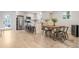 Bright, open kitchen flows into the dining area, perfect for entertaining and casual meals at 1645 Wabash St, Denver, CO 80220