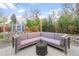 Cozy backyard patio area with comfortable outdoor seating and beautiful lighting at 1645 Wabash St, Denver, CO 80220
