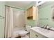 Clean bathroom with a shower-tub combination, a bright white sink, and neutral finishes at 1727 N Pearl St # 107, Denver, CO 80203