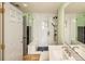 Modern bathroom featuring a glass-enclosed shower and sleek fixtures at 1727 N Pearl St # 107, Denver, CO 80203