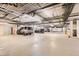 Spacious parking garage with ample parking and well-lit, open layout for easy access at 1727 N Pearl St # 107, Denver, CO 80203