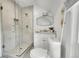Bathroom featuring a glass shower, modern vanity, and contemporary fixtures at 2143 S Acoma St, Denver, CO 80223