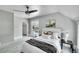 Comfortable bedroom with natural light, neutral tones, and soft carpet at 2143 S Acoma St, Denver, CO 80223