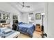 This bedroom offers bright lighting, a ceiling fan and a nice work space for all your needs at 2143 S Acoma St, Denver, CO 80223