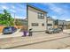 Contemporary home with unique architectural design, exterior siding and driveway at 2143 S Acoma St, Denver, CO 80223