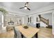 Bright and airy living room with hardwood floors and an open floor plan at 2143 S Acoma St, Denver, CO 80223