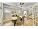 Cozy living room featuring hardwood floors, a fireplace, and ample seating at 2143 S Acoma St, Denver, CO 80223
