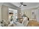 Comfortable living room with hardwood floors, stylish furnishings, and natural light at 2143 S Acoma St, Denver, CO 80223
