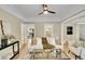 Spacious living room with hardwood floors, comfortable seating, and modern decor at 2143 S Acoma St, Denver, CO 80223