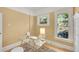 Home office space filled with natural light and a clear desk and wooden floor at 2143 S Acoma St, Denver, CO 80223
