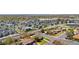 An aerial shot showcasing a dense neighborhood with a mix of modern townhomes and traditional single-Gathering houses at 2698 Fern Dr, Westminster, CO 80030