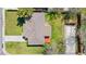 This aerial view showcases the property's layout, including its well-maintained lawn and detached garage at 2698 Fern Dr, Westminster, CO 80030