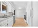 Bright kitchen features ample counter space and a functional layout, perfect for cooking at 2698 Fern Dr, Westminster, CO 80030