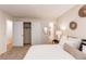 Bedroom view features open closet and ensuite bathroom at 8228 Marshall Ct, Arvada, CO 80003
