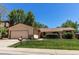 Charming single-story home featuring a manicured lawn, attached garage, and inviting curb appeal at 8228 Marshall Ct, Arvada, CO 80003