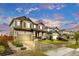 Attractive two-story residence with a well-maintained lawn, a spacious driveway, and a welcoming entrance at 6334 Empire Ave, Frederick, CO 80516