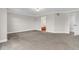 Large main bedroom featuring carpeting, and ensuite bathroom at 6334 Empire Ave, Frederick, CO 80516