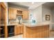 The bar area features beautiful wooden cabinetry and countertops at 11421 Belle Meade Dr, Conifer, CO 80433