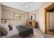 Cozy bedroom with a large window and comfortable furnishings at 11421 Belle Meade Dr, Conifer, CO 80433