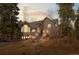 Inviting home exterior features a stone facade and steps leading to the entrance at 11421 Belle Meade Dr, Conifer, CO 80433
