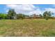 Backyard with mature trees and playground at 10101 W 72Nd Ave, Arvada, CO 80005