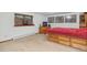 Bedroom with wood drawers under the bed for extra storage space at 10101 W 72Nd Ave, Arvada, CO 80005