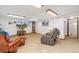 Finished basement living room with entertainment center and full bathroom at 10101 W 72Nd Ave, Arvada, CO 80005