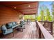 Relaxing outdoor deck with comfortable seating, perfect for enjoying nature and entertaining guests at 11457 Nancys Dr, Conifer, CO 80433