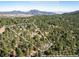 A beautiful aerial view of the home's location and 2.51 acre property at 31948 Highway 72, Golden, CO 80403