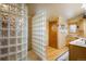 Unique bathroom design with stylish glass block shower and modern fixtures and fixtures at 31948 Highway 72, Golden, CO 80403