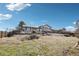 A shot of the backyard showing an overview of the yard at 12097 E Mexico Ave, Aurora, CO 80012