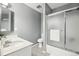 Bathroom features a shower, and marble countertop at 12097 E Mexico Ave, Aurora, CO 80012