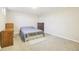 Well-lit bedroom with two dressers, offering ample storage and comfort at 12097 E Mexico Ave, Aurora, CO 80012