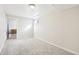 Bright, open bedroom with neutral colors and a bonus space at 12097 E Mexico Ave, Aurora, CO 80012